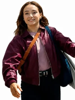 Close-up of the maroon real leather Below Ruby Stokes Maroon Leather Jacket showcasing the shirt style collar and zipper closure.