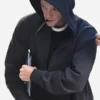 Black fleece fabric Clayface Tom Rhys Harries Hoodie highlighting the cozy front kangaroo pockets.