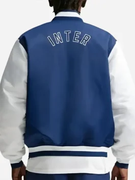 Back view of the blue and white satin Fanatics Fest NYC 2026 Inter Milan Jacket showing full length sleeves and rib knitted cuffs.