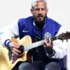 Close-up of the blue and white satin Fanatics Fest NYC 2026 Inter Milan Jacket showcasing the rib knitted collar and shiny satin finish.