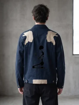 Blue denim Nicolas Cage Ghost Rider Denim Jacket featuring a shirt style collar and front button closure.