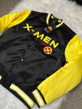 Black and yellow satin X-Men 97 Black Yellow Satin Bomber Jacket featuring a rib knitted collar and front button closure.