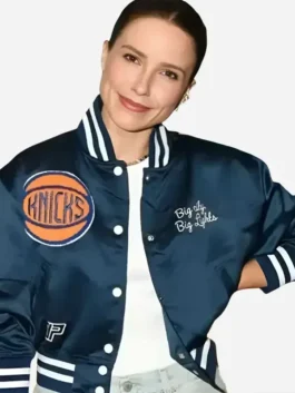 Blue satin Sophia Bush Knicks Blue Satin Varsity Jacket featuring a rib knitted collar and snap tab button closure.