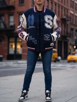 Navy wool and butter leather Protector Of NYC Navy and Butter Jacket showcasing full length sleeves and rib knitted cuffs.