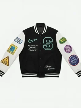 Front view of the black and white wool and PU leather Sabrina Ionescu Any Time Any Where Varsity Jacket detailing the snap tab button front and two-tone varsity silhouette.
