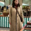 Beige cotton Selena Gomez Only Murders In The Building S06 Trench Coat highlighting its belted waist and button front closure.