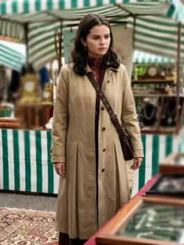 Beige cotton Selena Gomez Only Murders In The Building S06 Trench Coat highlighting its belted waist and button front closure.