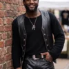 Black real leather The Tonight Show Shaboozey Leather Vest highlighting its dual button and zipper front closure.