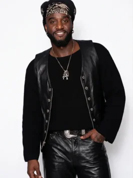 Close-up of the black real leather The Tonight Show Shaboozey Leather Vest detailing the collarless neckline and front button zipper closure.