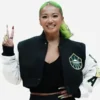 Black and white wool WNBA Seattle Storm Kayce Kirihara Jacket showcasing the rib knitted collar and snap tab closure.
